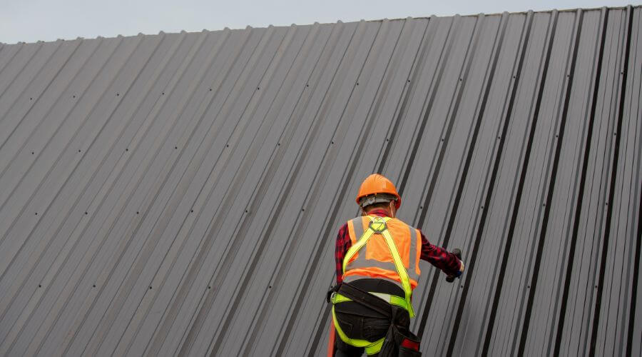 Professional metal roof installation services in Spalding, MI
